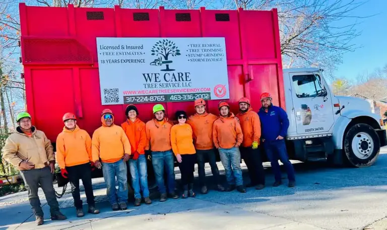 We Care Tree Service crew in front of their dump truck in Indianapolis